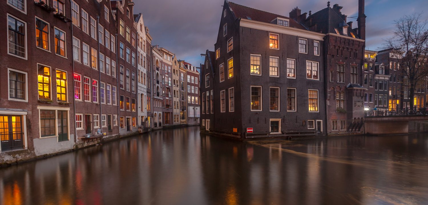 Canals at Amsterdam red light district. Copyright Hugh Conner - Shutterstock